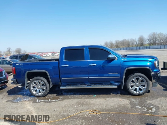 2018 GMC Sierra 1500 SLT z VIN 3GTU2NEC8JG254323, wystawiony jako IAAI lot #41772180 z przebiegiem 157 143 mil mil oraz . Historia ofert i sprzedaży dostępna na DreamBid. Obrazek 13.