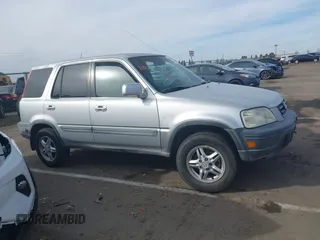 1998 Honda CR-V EX with VIN JHLRD1862WC058244, listed as a IAAI auction lot 41657867 with 183,655 mi miles. Bid and sale history available at carsss.com. Image 12.