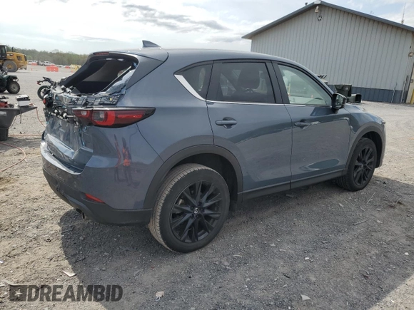 2023 Mazda CX-5 S Carbon Edition z VIN JM3KFBCM9P0158890, wystawiony jako Copart lot #53839045 z przebiegiem 26 623 mil mil oraz Szkody całkowita. Historia ofert i sprzedaży dostępna na DreamBid. Obrazek 3.