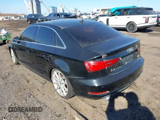 2016 Audi A3 Premium Plus z VIN WAUE8GFF4G1021048, wystawiony jako IAAI lot #41632960 z przebiegiem 107 911 mil mil oraz . Historia ofert i sprzedaży dostępna na DreamBid. Obrazek 3.