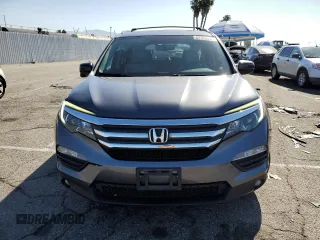 2016 Honda Pilot EX-L с VIN 5FNYF5H55GB003258, выставлен на аукционе Copart как лот 52395045 с пробегом 160 476 миль миль и Списание • Salvage title. История ставок и продаж доступна на DreamBid. Изображение 5.
