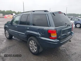 2001 Jeep Grand Cherokee Limited with VIN 1J4GW58S21C673916, listed as a IAAI auction lot 42127522 with Not Provided miles and . Bid and sale history available at DreamBid. Image 3.