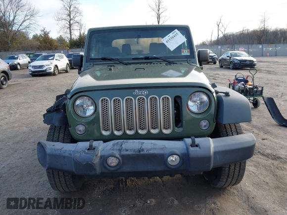 2016 Jeep Wrangler Sport with VIN 1C4AJWAG7GL330159, listed as a IAAI auction lot 41530415 with 98,554 mi miles and . Bid and sale history available at carsss.com. Image 12.
