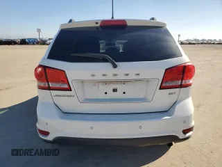 2017 Dodge Journey SXT with VIN 3C4PDCBB8HT675449, listed as a Copart auction lot 88999075 with 105,765 mi miles and Salvage Title. Bid and sale history available at DreamBid. Image 6.