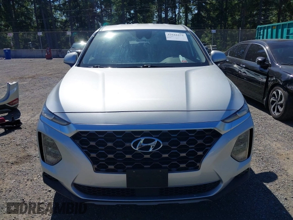 2019 Hyundai Santa Fe SE with VIN 5NMS2CAD9KH122140, listed as a IAAI auction lot 42616171 with 50,794 mi miles and . Bid and sale history available at DreamBid. Image 13.