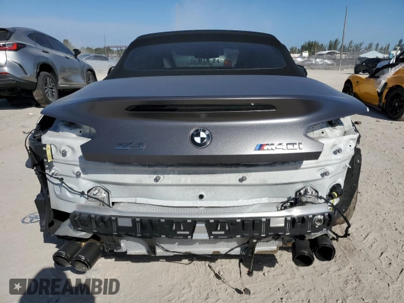 2021 BMW Z4 sDriveM40i with VIN WBAHF9C0XMWX16888, listed as a Copart auction lot 87046144 with 29,408 mi miles and Salvage Title. Bid and sale history available at carsss.com. Image 6.