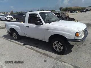 1999 Mazda B-Series 2WD Truck SX with VIN 4F4YR12C2XTM44471, listed as a IAAI auction lot 39659921 with 274,006 mi miles. Bid and sale history available at carsss.com. Image 1.