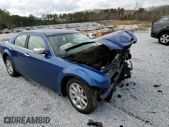 2009 Chrysler 300 LX with VIN 2C3KA43D29H581073, listed as a Copart auction lot 48702345 with 142,917 mi miles and Salvage Title. Bid and sale history available at carsss.com. Image 10.