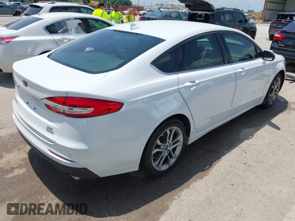 2020 Ford Fusion SEL with VIN 3FA6P0CD3LR152711, listed as a IAAI auction lot 42516763 with 97,073 mi miles and . Bid and sale history available at DreamBid. Image 4.