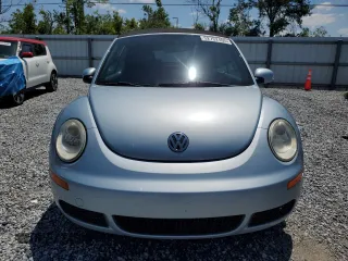 2009 Volkswagen Beetle S z VIN 3VWRF31Y29M407420, wystawiony jako Copart lot #52752405 z przebiegiem 147 982 mil mil oraz Czysty tytuł • Clean title. Historia ofert i sprzedaży dostępna na DreamBid. Obrazek 5.