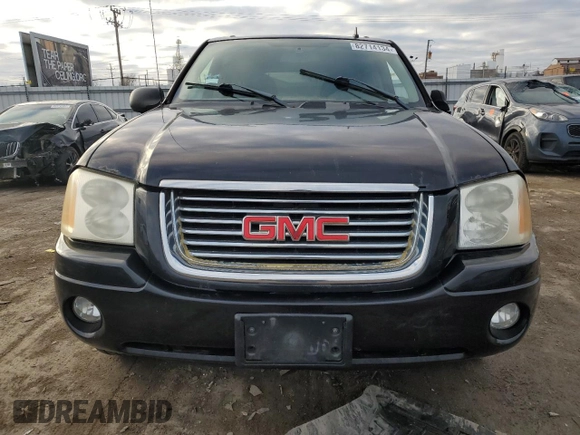 2006 GMC Envoy SLT with VIN 1GKDS13S762343520, listed as a Copart auction lot 82714134 with 0 mi miles and Clean Title. Bid and sale history available at carsss.com. Image 5.