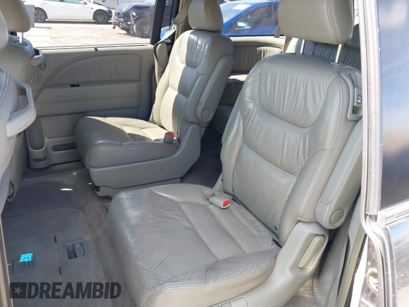 2005 Honda Odyssey TOURING with VIN 5FNRL38885B082482, listed as a IAAI auction lot 41879897 with 159,667 mi miles. Bid and sale history available at carsss.com. Image 8.