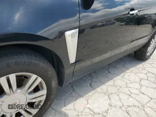 2014 Cadillac SRX Luxury Collection z VIN 3GYFNBE38ES527370, wystawiony jako Copart lot #55518735 z przebiegiem 141 379 mil mil oraz Szkoda całkowita • Salvage title. Historia ofert i sprzedaży dostępna na DreamBid. Obrazek 13.