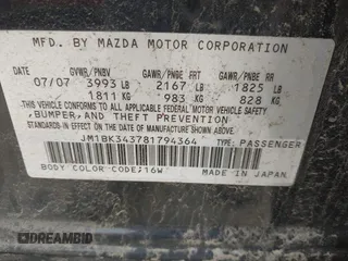 2008 Mazda 3 S Grand Touring z VIN JM1BK343781794364, wystawiony jako IAAI lot #42376872 z przebiegiem 208 690 mil mil oraz . Historia ofert i sprzedaży dostępna na DreamBid. Obrazek 9.