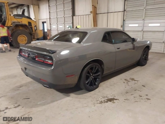 2018 Dodge Challenger SXT with VIN 2C3CDZAG0JH217129, listed as a IAAI auction lot 41088114 with 103,317 mi miles. Bid and sale history available at carsss.com. Image 4.