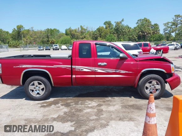 2006 Dodge Dakota SLT with VIN 1D7HE42K96S570558, listed as a IAAI auction lot 42016089 with 144,365 mi miles and . Bid and sale history available at carsss.com. Image 13.