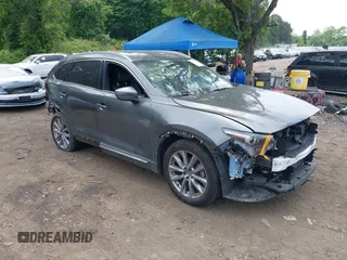 2020 Mazda CX-9 Grand Touring with VIN JM3TCBDY4L0408920, listed as a IAAI auction lot 42325272 with 45,837 mi miles and . Bid and sale history available at DreamBid. Image 1.