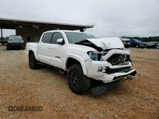 2023 Toyota Tacoma SR with VIN 3TMCZ5AN1PM632989, listed as a Copart auction lot 55642925 with 40,740 mi miles and Salvage title. Bid and sale history available at DreamBid. Image 14.