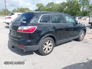 2012 Mazda CX-9 Touring with VIN JM3TB2CA7C0351670, listed as a IAAI auction lot 42148313 with 248,799 mi miles and . Bid and sale history available at DreamBid. Image 4.