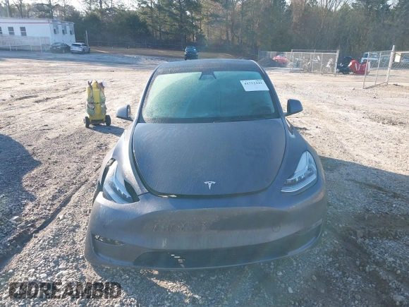 2022 Tesla Model Y Long Range with VIN 7SAYGAEE6NF361883, listed as a IAAI auction lot 41752441 with 50,493 mi miles and . Bid and sale history available at DreamBid. Image 12.
