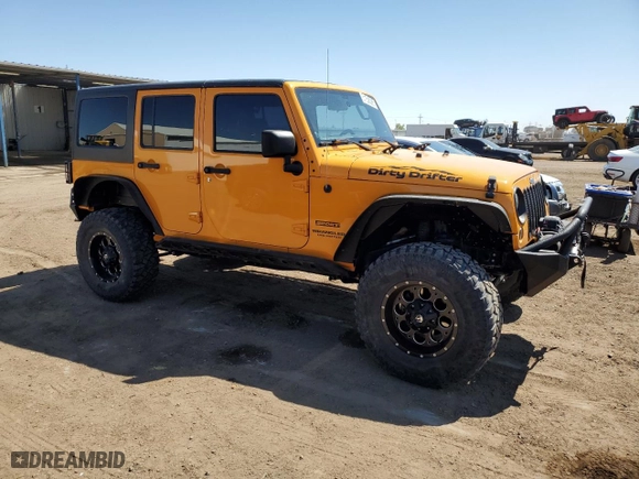 2012 Jeep Wrangler Unlimited Sport with VIN 1C4BJWDG8CL207111, listed as a Copart auction lot 51208395 with 87,926 mi miles and Salvage Title. Bid and sale history available at carsss.com. Image 4.