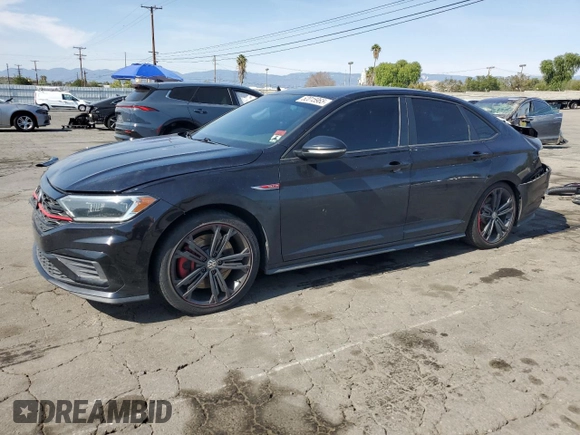 2019 Volkswagen Jetta GLI S with VIN 3VW5T7BU9KM143452, listed as a Copart auction lot 52015965 with 115,652 mi miles and Salvage title. Bid and sale history available at DreamBid. Image 1.