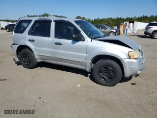 2003 Ford Escape XLS Popular with VIN 1FMYU92103KA61192, listed as a Copart auction lot 46611595 with 93,467 mi miles and Salvage Title. Bid and sale history available at carsss.com. Image 4.