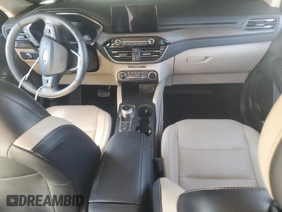 2020 Ford Escape Titanium Hybrid z VIN 1FMCU9DZ6LUC47658, wystawiony jako Copart lot #59599995 z przebiegiem 63 004 mil mil oraz Szkoda całkowita • Salvage title. Historia ofert i sprzedaży dostępna na DreamBid. Obrazek 8.