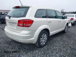 2015 Dodge Journey SE z VIN 3C4PDCAB6FT736330, wystawiony jako IAAI lot #41837047 z przebiegiem 123 567 mil mil oraz . Historia ofert i sprzedaży dostępna na DreamBid. Obrazek 4.