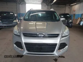 2015 Ford Escape Titanium z VIN 1FMCU9J96FUB23902, wystawiony jako IAAI lot #42497188 z przebiegiem 164 452 mil mil oraz . Historia ofert i sprzedaży dostępna na DreamBid. Obrazek 12.