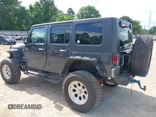 2008 Jeep Wrangler Unlimited Sahara with VIN 1J4GA591X8L520621, listed as a IAAI auction lot 42525613 with 184,239 mi miles and . Bid and sale history available at DreamBid. Image 3.