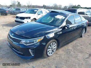 2017 Kia Optima EX with VIN 5XXGU4L33HG135421, listed as a IAAI auction lot 41738011 with 128,594 mi miles. Bid and sale history available at carsss.com. Image 2.
