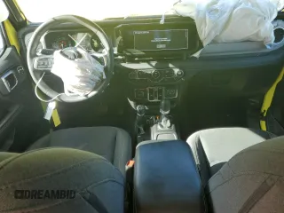 2024 Jeep Wrangler Sahara with VIN 1C4RJXP6XRW238620, listed as a Copart auction lot 63217765 with 29,304 mi miles and Clean title. Bid and sale history available at DreamBid. Image 8.