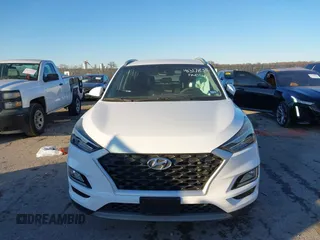 2019 Hyundai Tucson Sport with VIN KM8J33AL1KU838499, listed as a IAAI auction lot 41317832 with 71,594 mi miles. Bid and sale history available at carsss.com. Image 12.