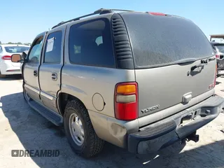 2003 GMC Yukon SLT z VIN 1GKEC13T73R169865, wystawiony jako IAAI lot #42238716 z przebiegiem Nie podano mil oraz . Historia ofert i sprzedaży dostępna na DreamBid. Obrazek 3.
