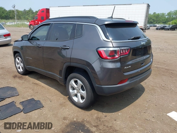 2019 Jeep Compass Altitude with VIN 3C4NJDBB1KT734970, listed as a IAAI auction lot 42483357 with 59,425 mi miles and . Bid and sale history available at DreamBid. Image 3.