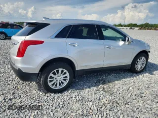 2018 Cadillac XT5 AWD with VIN 1GYKNBRS9JZ100499, listed as a Copart auction lot 59094525 with 89,073 mi miles and Clean title. Bid and sale history available at DreamBid. Image 3.
