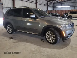 2012 BMW X5 35i z VIN 5UXZV4C5XCL767234, wystawiony jako Copart lot #64117285 z przebiegiem 187 969 mil mil oraz Czysty tytuł • Clean title. Historia ofert i sprzedaży dostępna na DreamBid. Obrazek 4.
