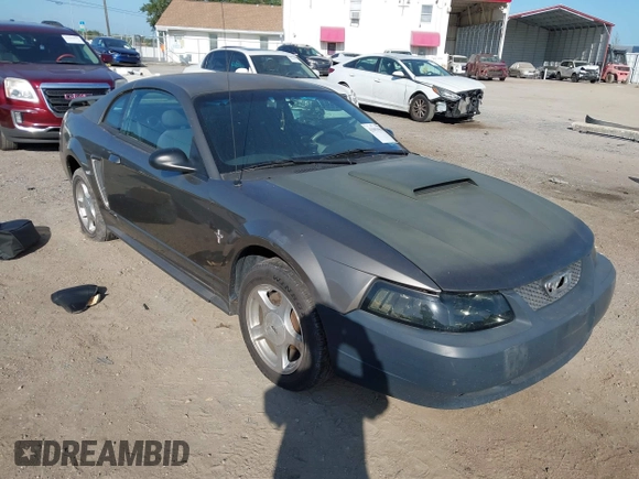 2001 Ford Mustang Standard with VIN 1FAFP40461F264327, listed as a IAAI auction lot 42002990 with 316,107 mi miles. Bid and sale history available at carsss.com. Image 1.