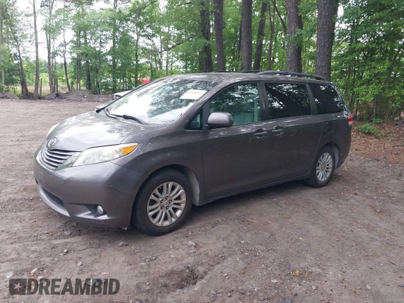 2011 Toyota Sienna XLE AAS with VIN 5TDYK3DC8BS016319, listed as a IAAI auction lot 42186294 with 293,401 mi miles and . Bid and sale history available at DreamBid. Image 2.