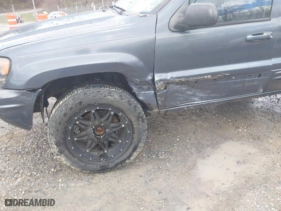 2003 Jeep Grand Cherokee Limited with VIN 1J4GW58N43C521617, listed as a IAAI auction lot 41781064 with 228,086 mi miles. Bid and sale history available at carsss.com. Image 6.