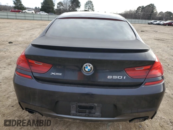 2013 BMW 6 Series 650i xDrive with VIN WBA6B4C57DDG67648, listed as a Copart auction lot 45528485 with 128,785 mi miles and Clean Title. Bid and sale history available at carsss.com. Image 6.