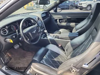 2008 Bentley Continental GT with VIN SCBDR33W68C052142, listed as a Copart auction lot 69032654 with 79,229 mi miles and Salvage Title. Bid and sale history available at DreamBid. Image 7.