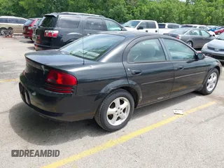 2006 Dodge Stratus SXT z VIN 1B3EL46X06N111122, wystawiony jako IAAI lot #42343809 z przebiegiem 160 705 mil mil oraz . Historia ofert i sprzedaży dostępna na DreamBid. Obrazek 4.