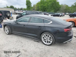 2023 Audi A5 Sportback S line Premium Plus with VIN WAUFACF56PA040015, listed as a Copart auction lot 53642035 with 23,669 mi miles and Salvage Title. Bid and sale history available at carsss.com. Image 2.