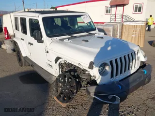 2023 Jeep Wrangler 4xe Sahara with VIN 1C4JJXP61PW516265, listed as a IAAI auction lot 41371597 with 28,448 mi miles. Bid and sale history available at carsss.com. Image 1.