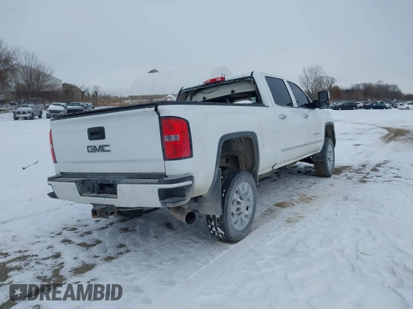 2015 GMC Sierra 2500HD available WiFi Denali with VIN 1GT120E88FF680538, listed as a IAAI auction lot 41571684 with 125,147 mi miles. Bid and sale history available at carsss.com. Image 4.
