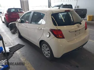 2015 Toyota Yaris L with VIN VNKKTUD38FA041692, listed as a IAAI auction lot 41158412 with Not Provided miles. Bid and sale history available at carsss.com. Image 3.