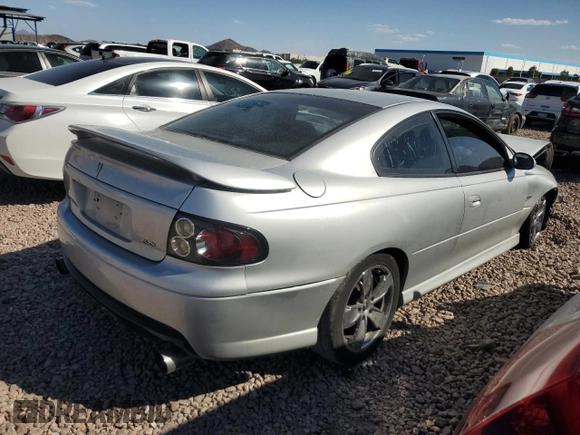 2006 Pontiac GTO z VIN 6G2VX12U86L519612, wystawiony jako Copart lot #73336964 z przebiegiem 122 003 mil mil oraz Szkoda całkowita • Salvage title. Historia ofert i sprzedaży dostępna na DreamBid. Obrazek 3.