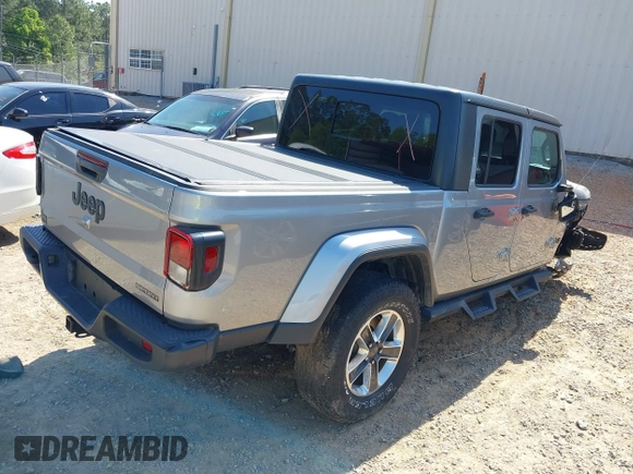 2021 Jeep Gladiator Willys z VIN 1C6HJTAG6ML507039, wystawiony jako IAAI lot #42057637 z przebiegiem 69 443 mil mil oraz . Historia ofert i sprzedaży dostępna na DreamBid. Obrazek 4.